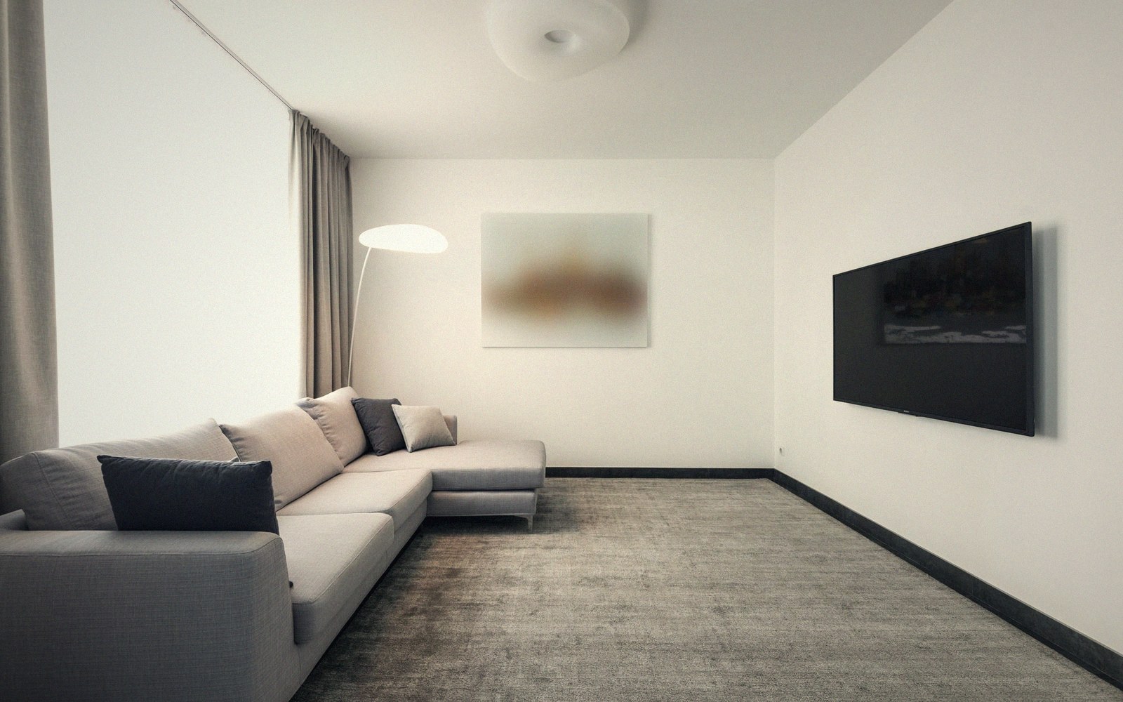 Sectional sofa faces a wall-mounted flat-screen TV in a minimalist living room