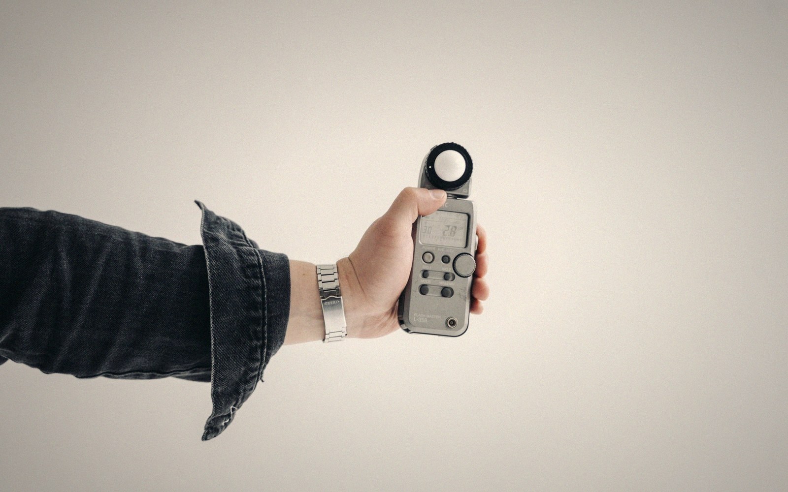 A light meter reading against a lit test pattern
